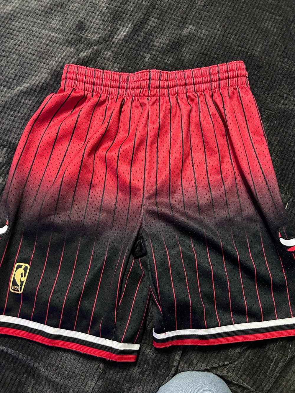 8. Mitchell & Ness Chicago Bulls Red to Black Fade Pinstripe Kids Shorts